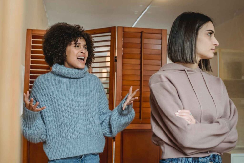 2 girls in disagreement about social responsibility
